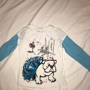 white and blue long sleeve with design